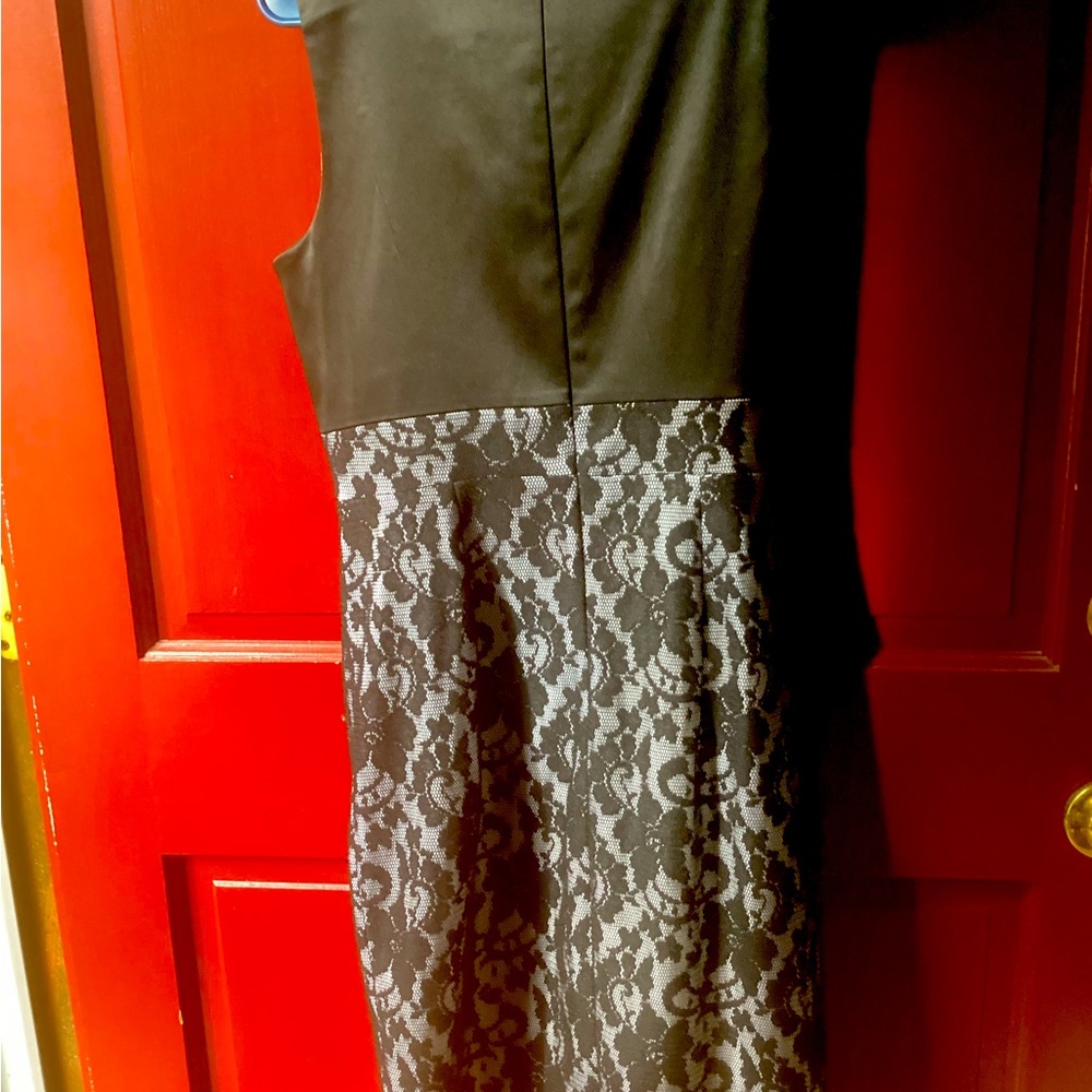 Pretty black lace dress,worn once to a wedding, very flattering.sz7/8